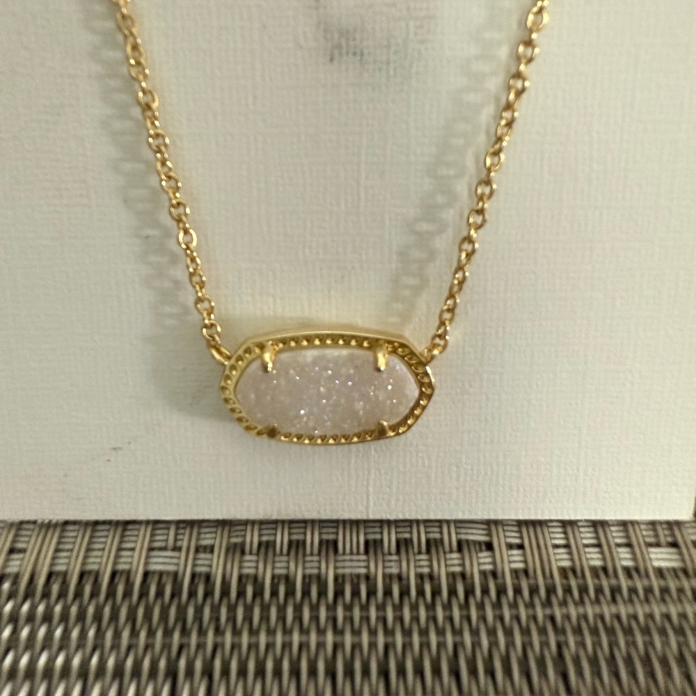 Elegant Gold Necklace with White Stone